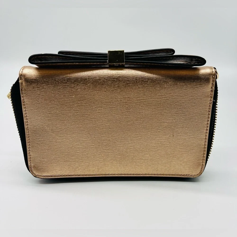Aldo rose gold wallet with top bow